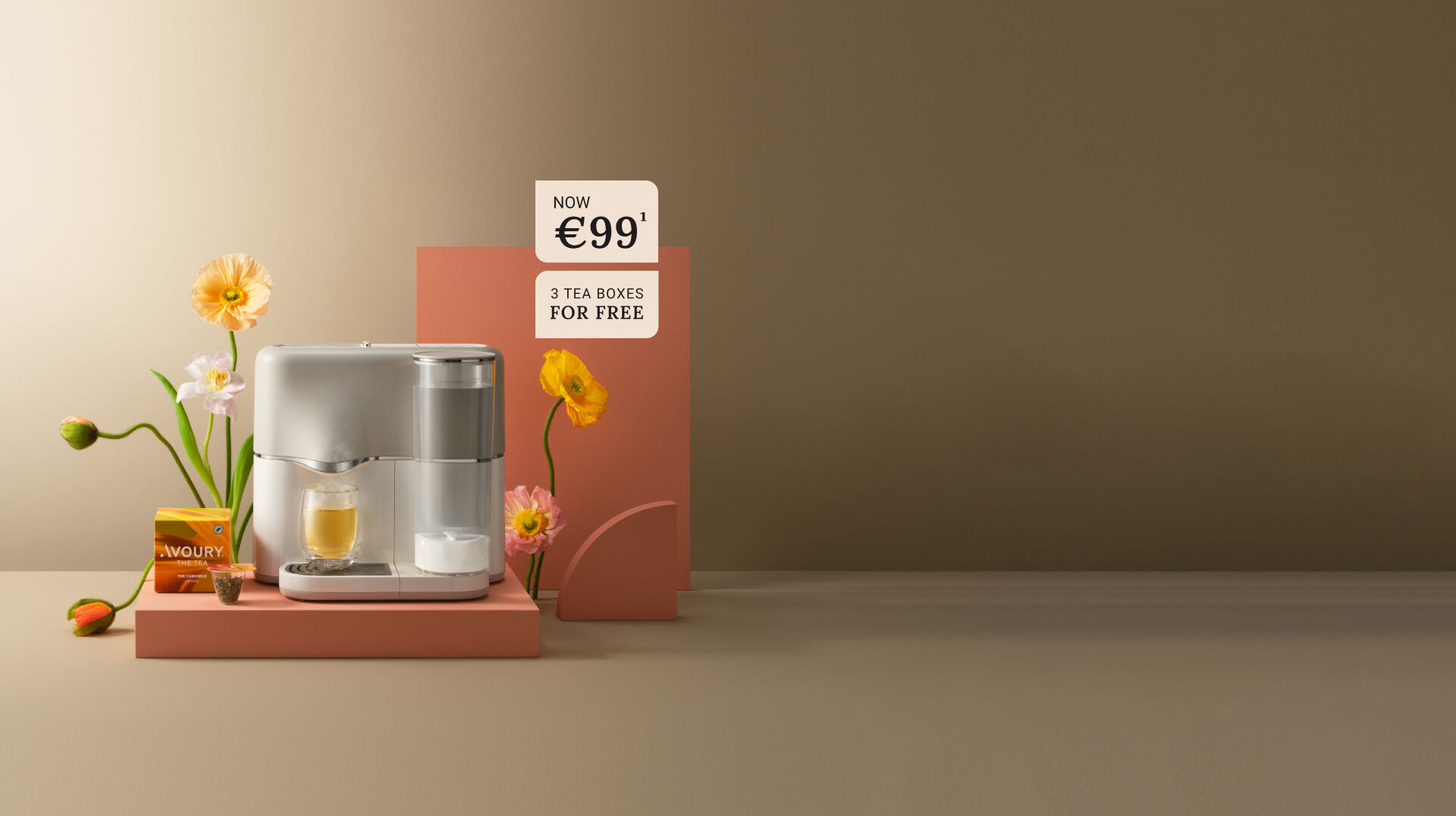 Avoury One tea machine in silver white with a cup of organic tea